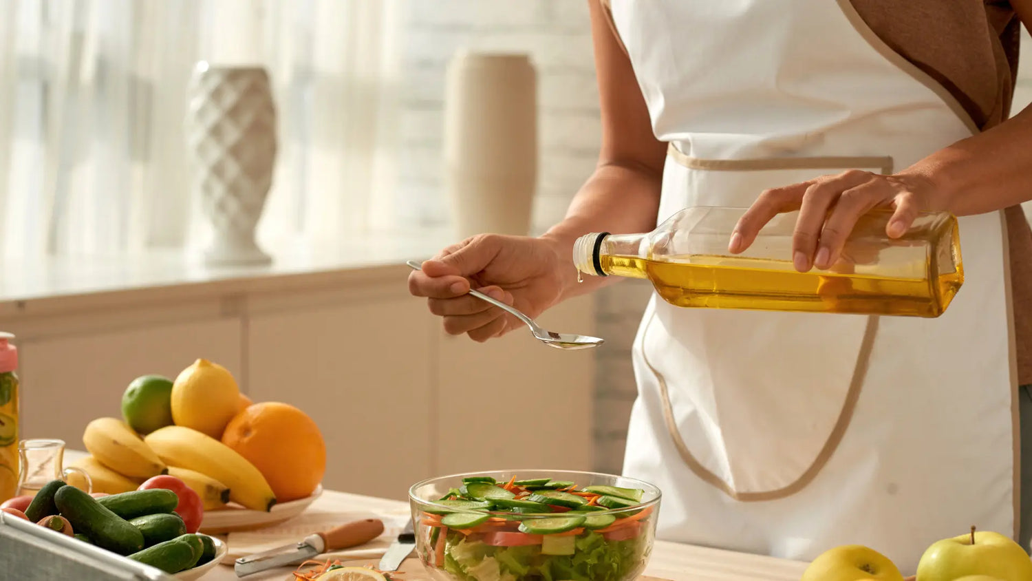 Pouring THC-infused cooking oil while preparing food in a kitchen