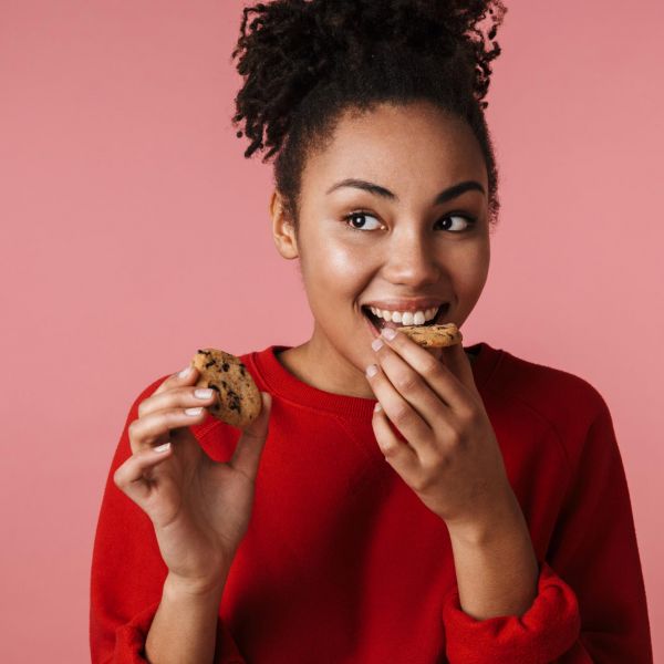 woman eating a cookie